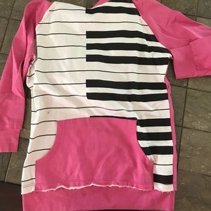 Beautiful hot pink sweatshirt with piano keys!